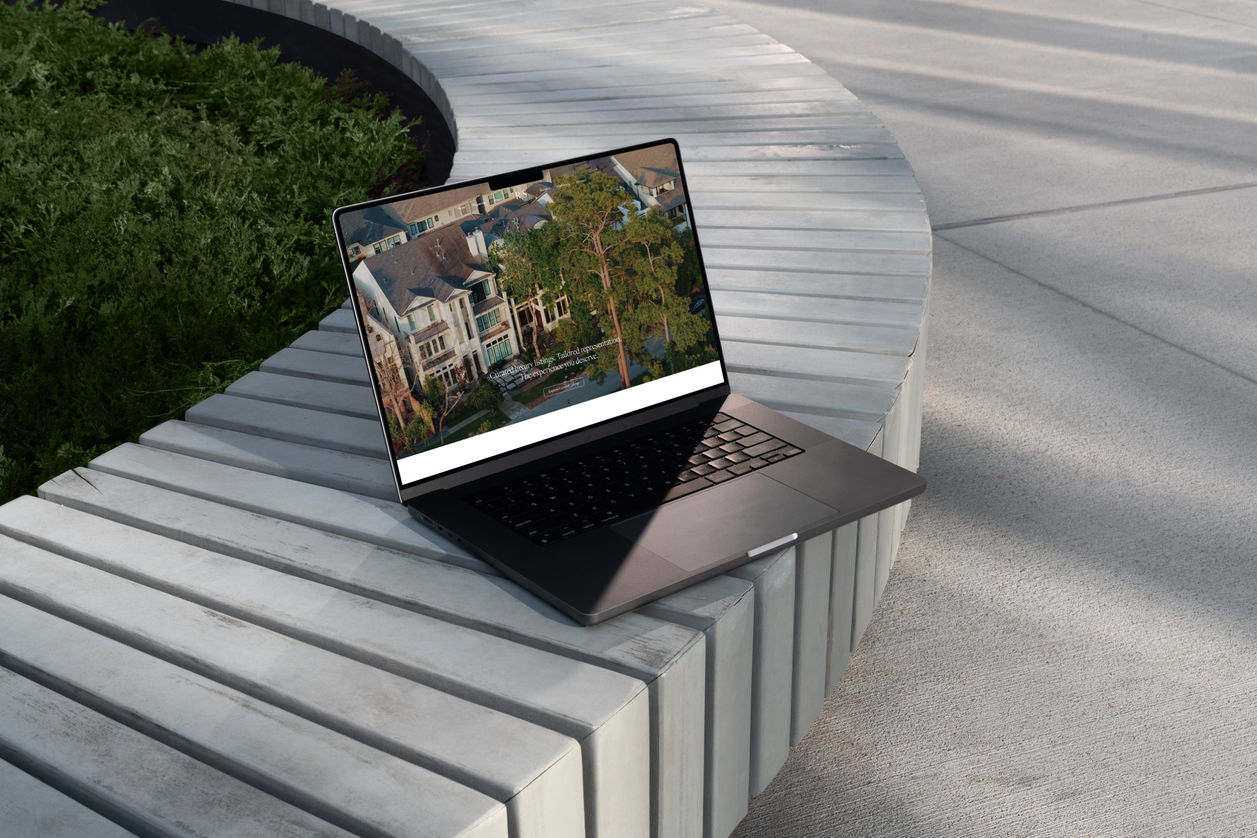 Rich Stone – luxury real estate media website mockup designed by Weble Studio